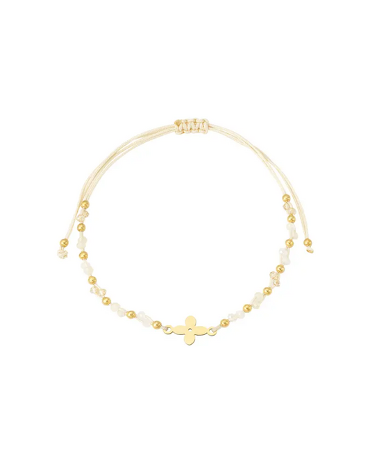 Yehwang | Armband Meiko met witte & gouden kraaltjes, en een gouden bloemenbedel | Conceptstore Sisalla